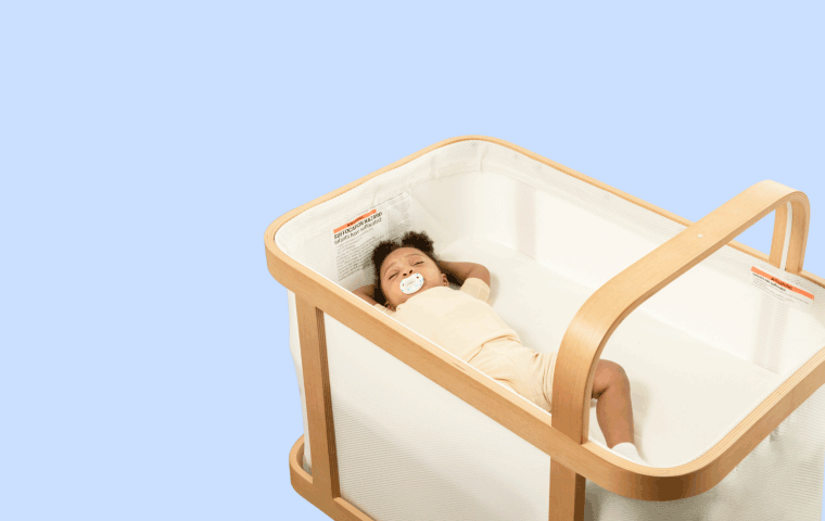 An animated series of images showing a baby and cloud animations, demonstrating the process of upgrading a regular crib to a Cradlewise smart crib, showcasing the easy installation and setup steps to enhance the crib with smart monitoring and soothing features.