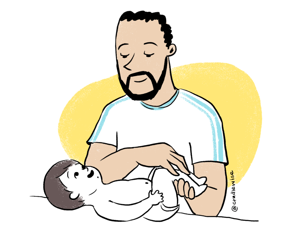 Dad massages baby and enhances bond 